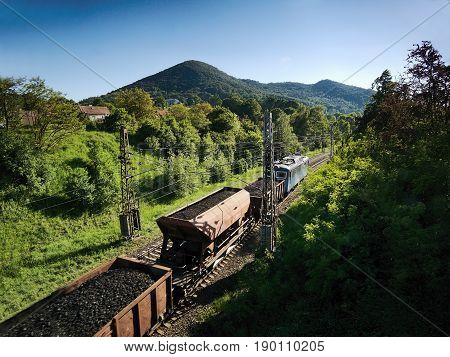 Sebuzin Czech republic - May 19 2017: Freight train with coal running afternoon spring landscape