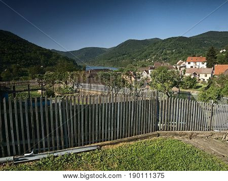 Sebuzin Czech republic - May 19 2017: view from wooden fence to Sebuzin village with valley of european river Labe on background at spring