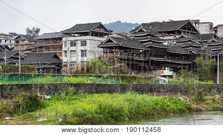 Country Houses In On Riverbank In Chengyang