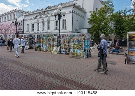Russia, Moscow, June 7, 2017: People Walking On Old Arbat Street In Summer.