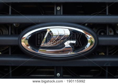BUDAPEST, HUNGARY - JUNE 01, 2017: Shiny logo on the facade of a Lada 4x4. Lada models became popular especially in Eastern Europe.