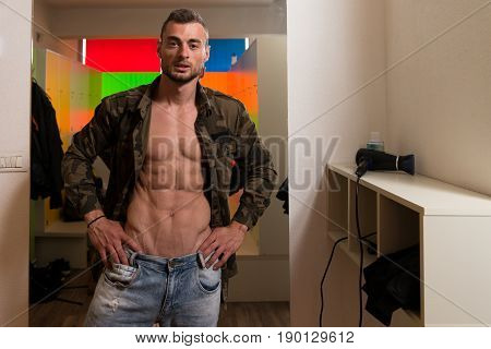 Adult Man In Locker Room Changes Clothings