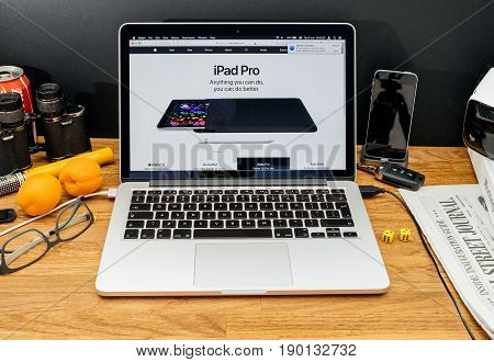PARIS FRANCE - JUNE 6 2017: Apple Computers website on MacBook Retina in creative environment showcasing latest news from Apple at WWDC 2017 - new iPod Pro showcase with Apple pencil
