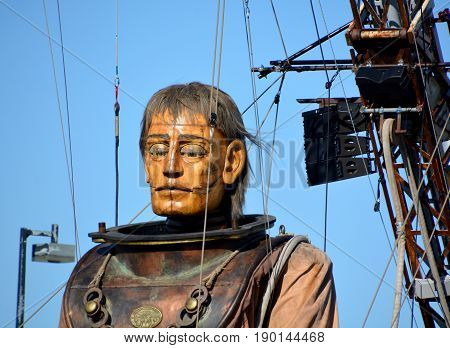 MONTREAL QUEBEC CANADA 19 05 17: The giant deep-sea diver sleeping in the street of Montreal for the 375e anniversary of the city, by Royal De Luxe company Nantes France