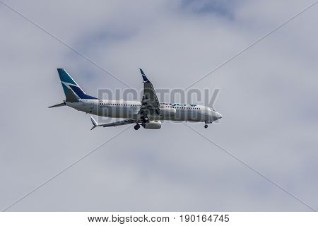 Richmond Canada - June 4, 2017, Jet aircraft in the morning going to YVR Airport