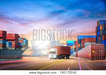 Logistics import export background and transport industry of Container Cargo freight ship at sunset sky