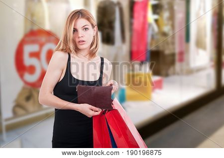 Fashion Girl Holding Wallet And Gift Bags
