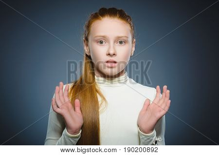 Closeup Scared and shocked little girl. Human emotion face expression.