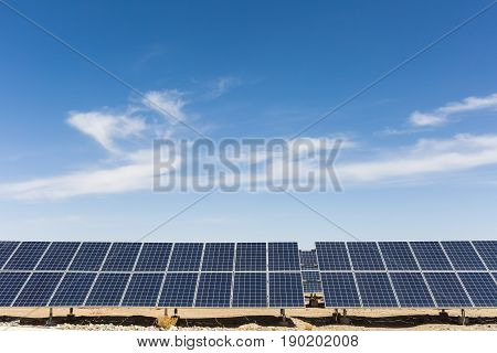 solar panels on the gobi against a blue sky new energy background