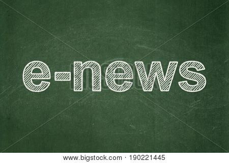 News concept: text E-news on Green chalkboard background