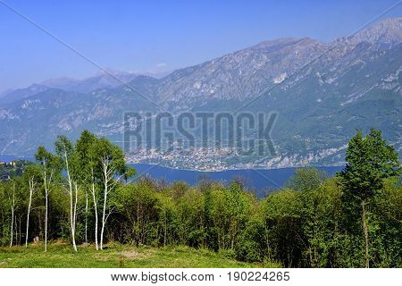 Madonna del Ghisallo at top of the famous Ghisallo pass (Como Lombardy Italy). View of the Como lake (Lario). The Madonna del Ghisallo is the protector of the cyclists