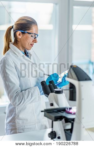 Female Scientist In Lab, Toned Image, Indoors, One Person Only