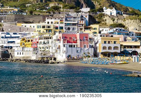 Ischia, Italy - April, 2017: tourist harbor with typical Mediterranean boats in the Sant'angelo on Ischia Island, tourist destination in the Gulf of Naples, Italy