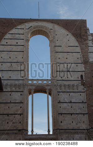 Italy Siena - December 26 2016: the view of incomplete facade of the planned Duomo nuovo. Facciatone on December 26 2016 in Siena Tuscany Italy.
