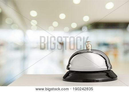 Bell service desk reception hotel table background