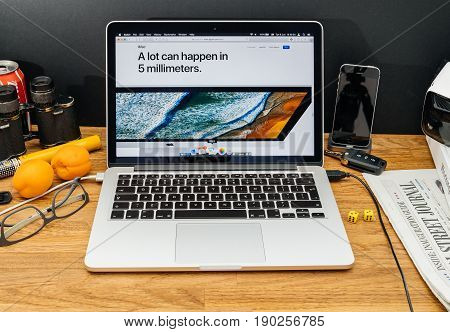 PARIS FRANCE - JUNE 6 2017: Apple Computers website on MacBook Retina in creative environment showcasing latest news from Apple at WWDC 2017 - 5mm computer bezel imac pro