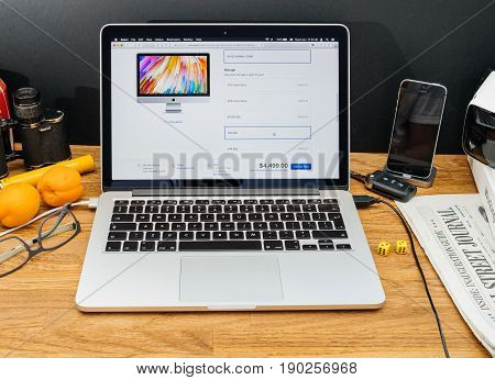 PARIS FRANCE - JUNE 6 2017: Apple Computers website on MacBook Retina in creative environment showcasing latest news from Apple at WWDC 2017 -