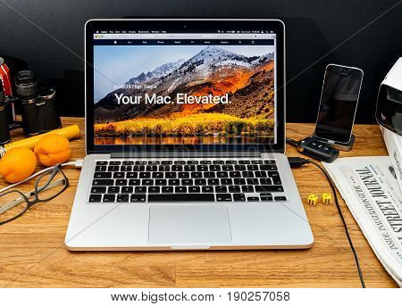 PARIS FRANCE - JUNE 6 2017: Apple Computers website on MacBook Retina in creative environment showcasing latest macOS High Sierra from Apple at WWDC 2017 - presentation of the new operating system