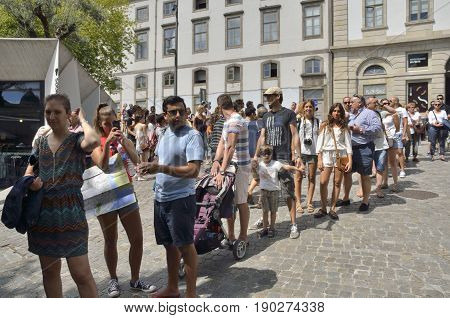 PORTO, PORTUGAL - AUGUST 7, 2015: Queu to get the tickets to the famous bookstore Lello in Porto Portugal.
