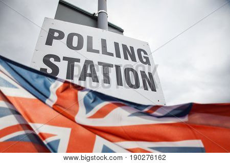 polling station sign and Union Jack flag - UK general elections