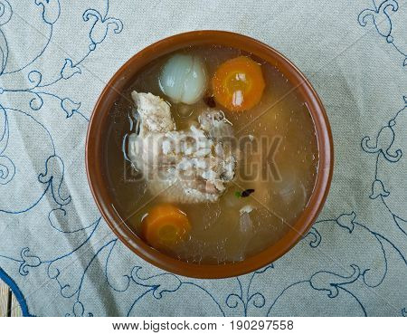 Toyuq shorbasi - Turkish chicken soup. close up.
