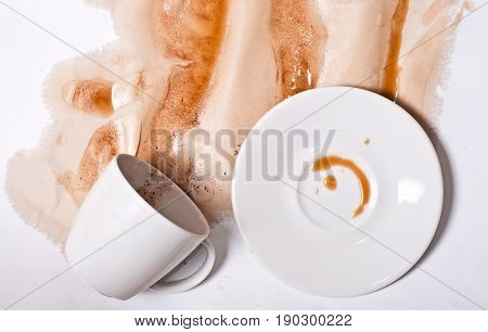 Coffee cup spill on white background. Creative coffee art background