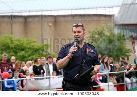 Beaulieu, Hampshire, Uk - May 29 2017: Fire Dog Handler Of The Hampshire Arson Task Force Addressing