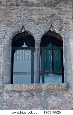 27 may 2017-vittorio veneto-Windows of a historic palace in the city of vittorio veneto