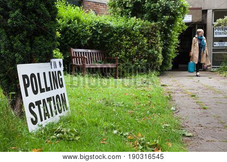 LONDON, UNITED KINGDOM - JUNE 8, 2017: Unidentified citizens going to vote at a polling station during the British general elections in South London, United Kingdom on June 8, 2017.