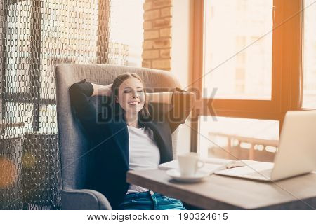 Lunch Time. Time To Rest. Pause At Work Place In A Modern And Cozy Coworking. Young Freelancer Is Re