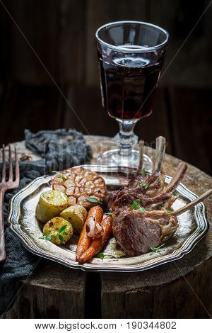 Grilled Ribs Of Lamb Served With Red Wine
