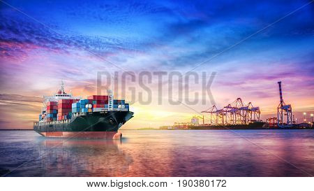 Logistics and transportation of International Container Cargo ship in the ocean at twilight sky Freight Transportation Shipping