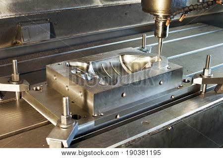 Industrial metal mold/ blank milling. Metalworking and mechanical engineering. CNC technology. Milling lathe and drilling industry.
