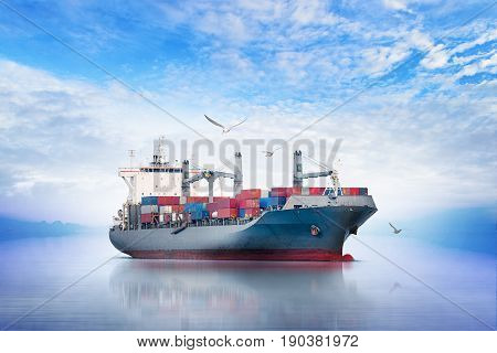 International Container Cargo ship in the ocean with Group of Birds Freight Transportation Shipping