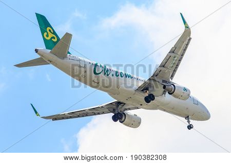Bangkok, Thailand. - April 8, 2017 : Plane Airbus a320 of Spring Airlines on the sky landing to Suvanabhumi airport.