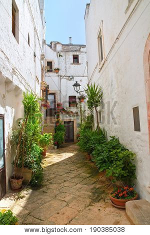 Characteristic alleyway of Locorotondo. Puglia. Southern Italy.