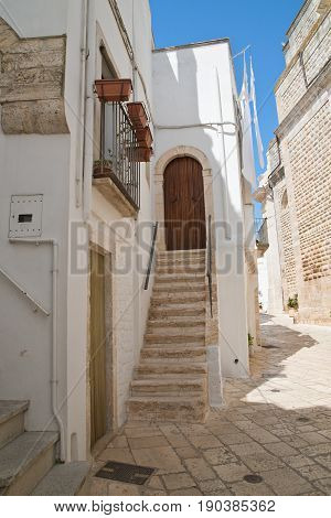 Characteristic alleyway of Locorotondo. Puglia. Southern Italy.