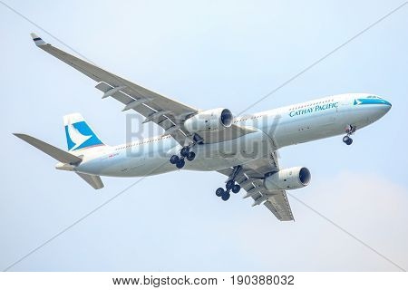 Bangkok, Thailand. - April 22, 2017 : Plane of Cathy Pacific Airlines or Airways on the sky landing to Suvanabhumi airport.