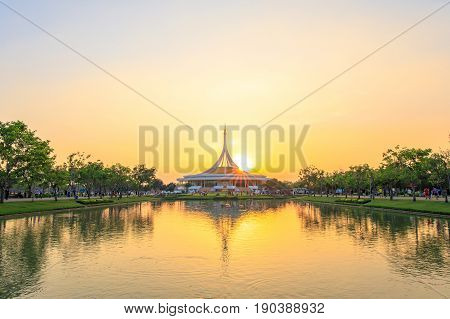 Bangkok, Thailand. - April 23, 2017 : Sunlight, Sunrays or sunbeam star over the roof of Ratchamangkhala Pavilion at public park name Suan Luang Rama IX on sunset time Bangkok, Thailand.