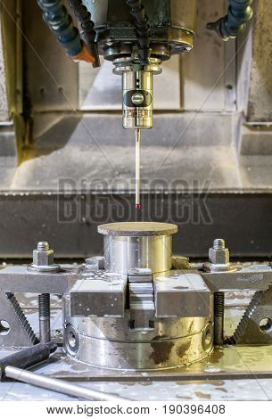 Industrial metal chuck die/mold sensoring. Metalworking and mechanical engineering. Lathe milling and drilling technology. CNC industry. Indoors vertical image.