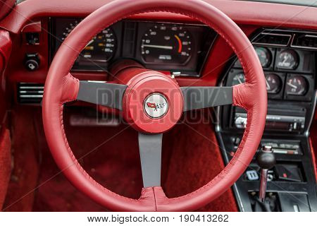 PAAREN IM GLIEN GERMANY - JUNE 03 2017: Interior of the sports car Chevrolet Corvette (C3) 1982. Focus on the foreground. Exhibition 