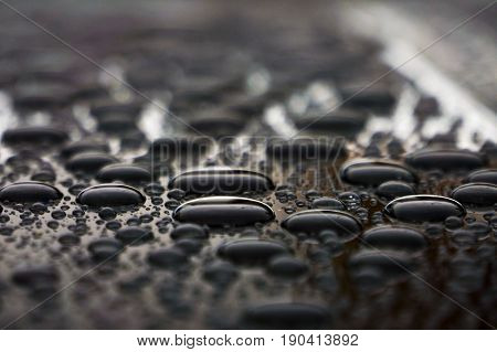 Drops of water on the roof color, nature background close up