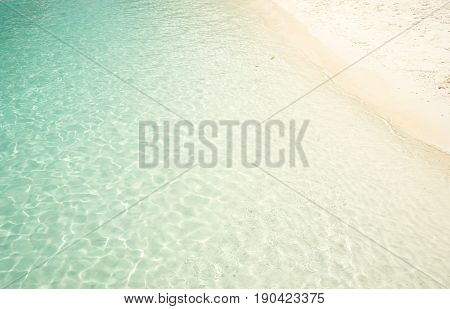 Beach tropical with white sandy and crystal water seen from above. Rawa island Malaysia .