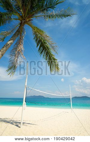 Rawa Beach with beach volleyball court in sunny day world famous destination beautiful weather and idyllic tropical island .
