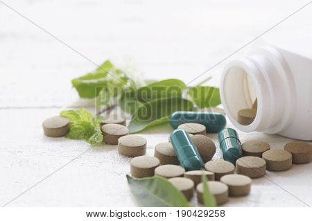 pill herbal on top view of wood table and copy space