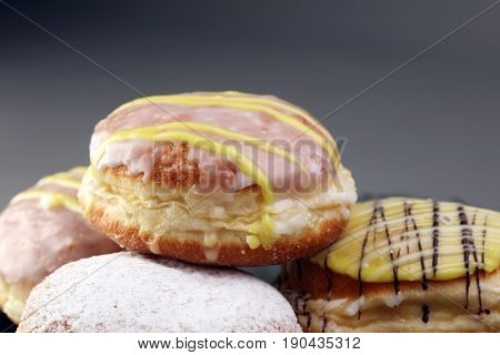German Donuts - Berliner With Jam And Icing Sugar In A Tray On A Grey Background.