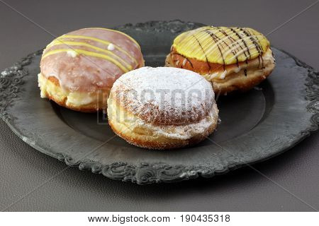 German Donuts - Berliner With Jam And Icing Sugar In A Tray On A Grey Background.