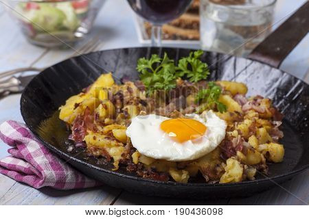 tiroler groestl a potato dish with an egg
