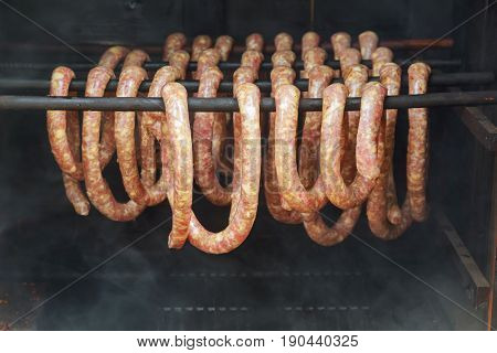 Smoked Sausages Hanging In Smokehouse, Smoked Sausages In Traditional Way.