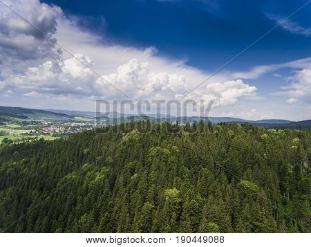 Aerial View Of The Summer Time In Mountains Near Stronie Slaskie Town In Poland. Pine Tree Forest An